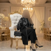 مانتو مجلسی زنانه مدل عطرین جنس سوپر مازراتی مشکی با خرجکار پولکدوزی و مغزی شاین سایز 38 تا 60