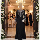 پیراهن مجلسی زنانه مدل طلوع جنس کرپ دالقیچ مشکی با خرجکار نگین و مروارید سایز 38 تا 60
