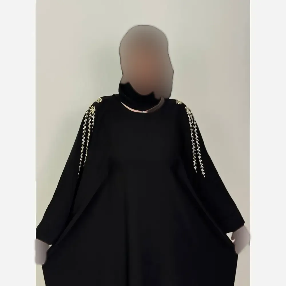 عبای زنانه مجلسی مشکی سرشونه طلایی جنس الیزه فری سایز 38 تا 60