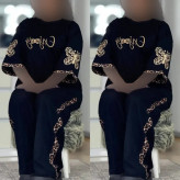 ست تیشرت و شلوار زنانه مدل enjoy جنس اسپان گلکسی رنگ مشکی فری سایز 38 تا 46