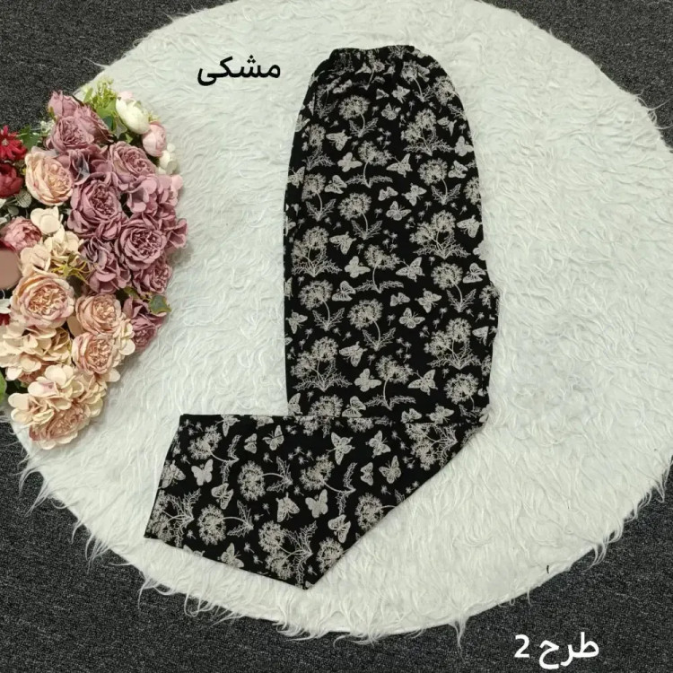 شلوار راحتی زنانه سایز بزرگ جنس برداشت نخی قواره دار فری سایز 44 تا 56