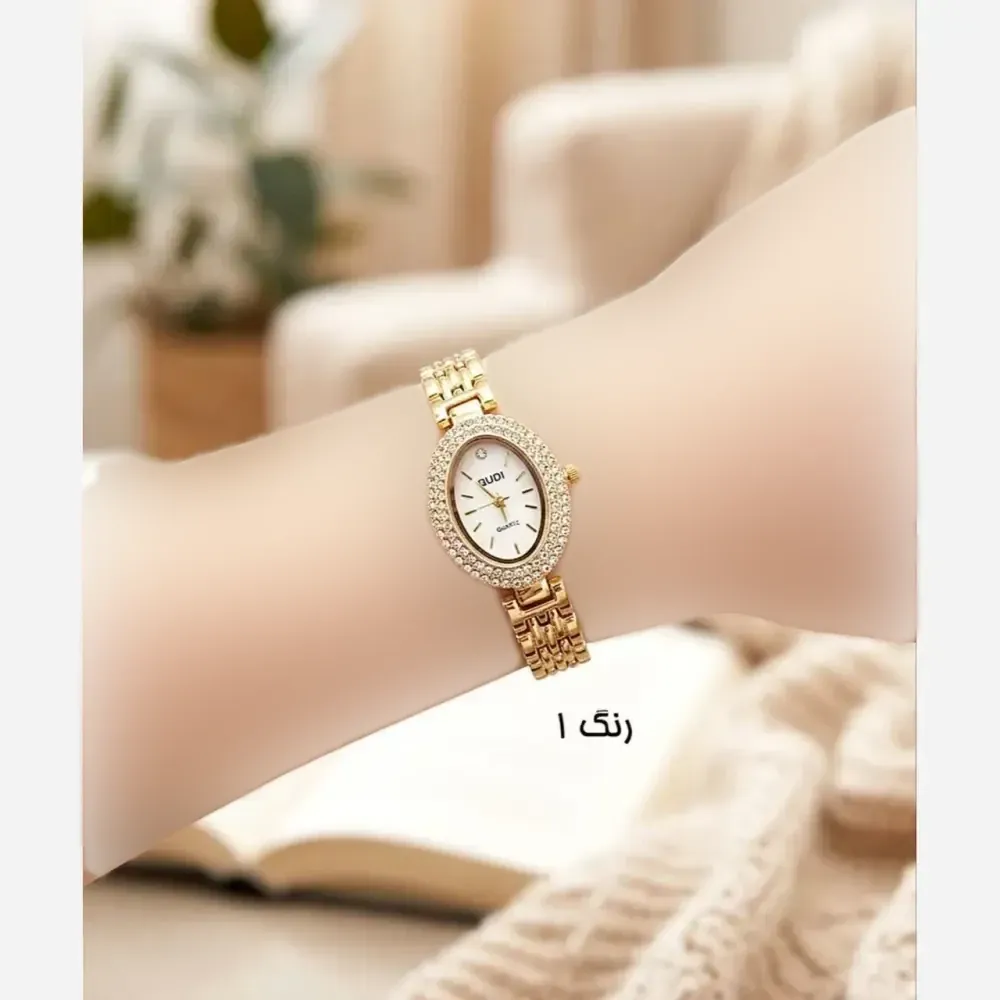 ساعت مچی زنانه استیل طلایی صفحه بیضی نگیندار مجلسی