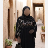 پیراهن زنانه مدل زرگل جنس کرپ الیزه مشکی سایز بزرگ 38 تا 60 با خرجکار پولک دوزی و نوار منگوله قد 140