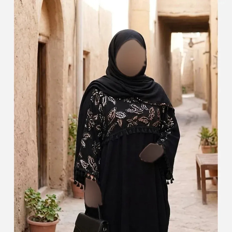 پیراهن زنانه مدل زرگل جنس کرپ الیزه مشکی سایز بزرگ 38 تا 60 با خرجکار پولک دوزی و نوار منگوله قد 140